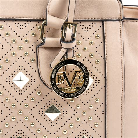 versace 1969 abbigliamento|versace bags 1969 italia collection.